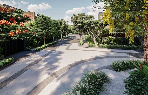 Tree-lined walkway through the plaza