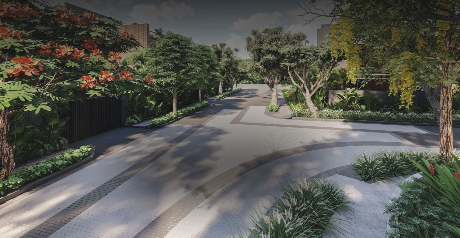 Tree-lined street inside the enclave, Balinese-inspired planting on both sides